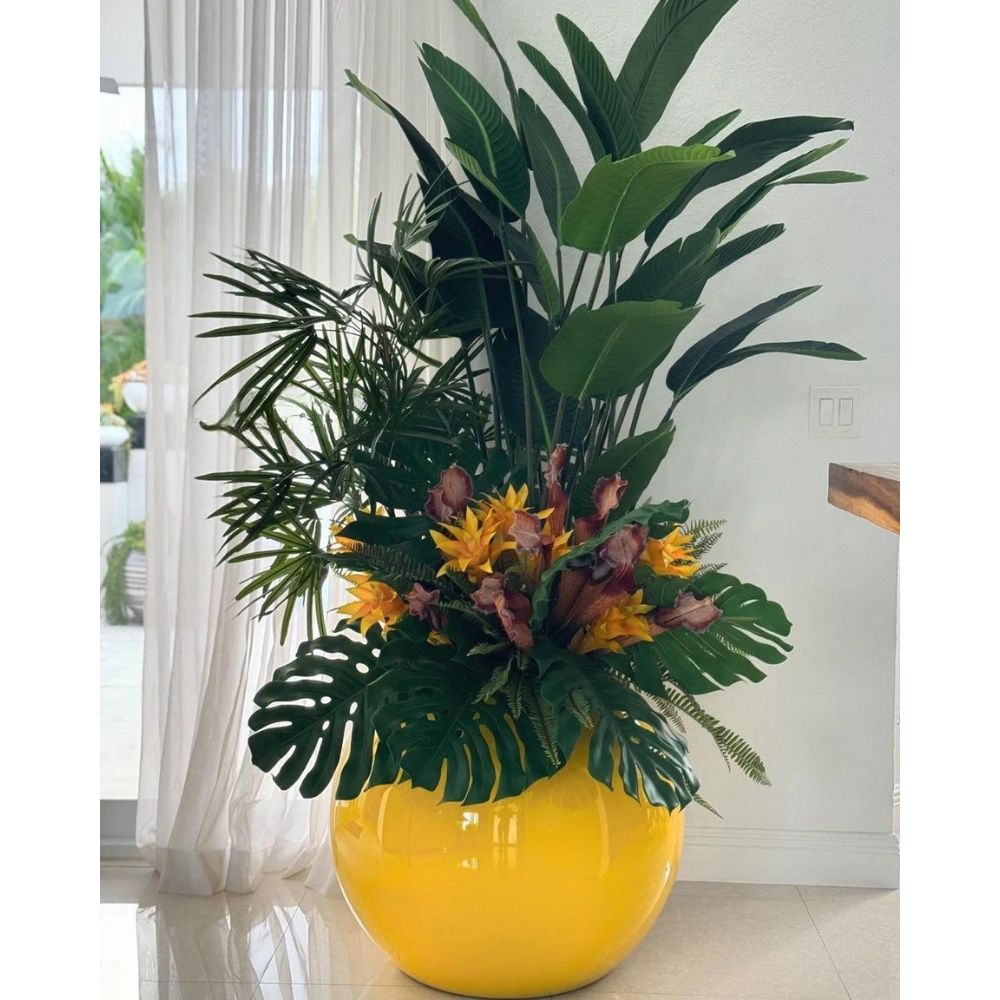 Tropical Mix Plants in Yellow Globe Planter
